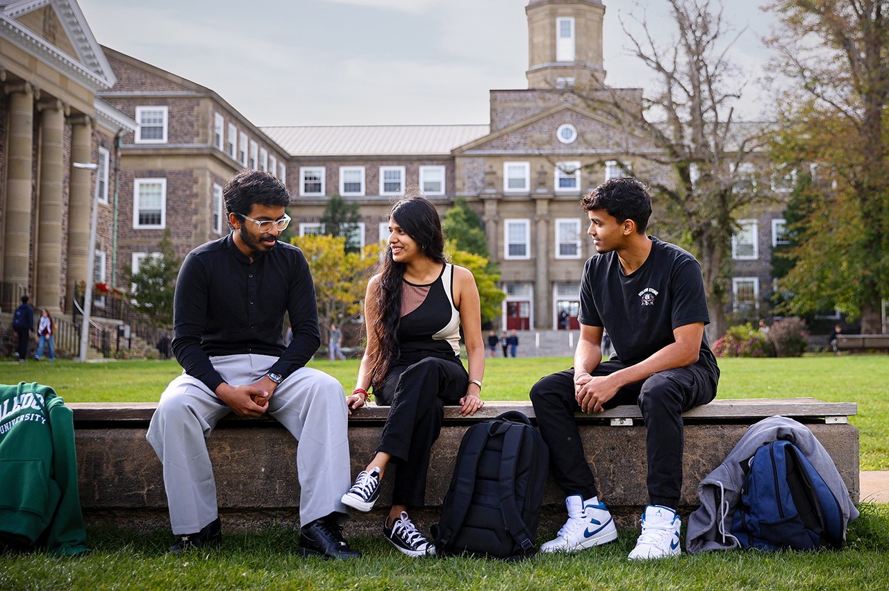 International students from India chat in the Dalhousie University quad in front of the Henry Hicks Bulding